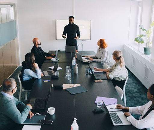 services man presenting in conference room